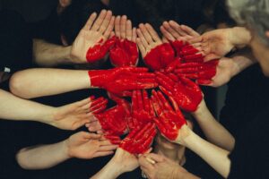 Many hands come together to make a big heart.